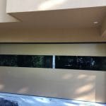 Smooth overhead Garage Doors Installation With Glass Insert In Toronto home
