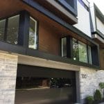 Toronto Installation of smooth black glass garage door