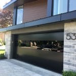 Smooth Black Garage Doors with Glass-installed in Toronto Home