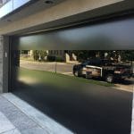 flush Smooth Black Garage Doors with Glass-Toronto Installation
