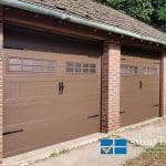 Overhead Garage Doors installation in Toronto featuring classic carriage style doors