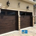 overhead Garage Doors replacement in Toronto featuring twin flush panel doors in cedarwood finish